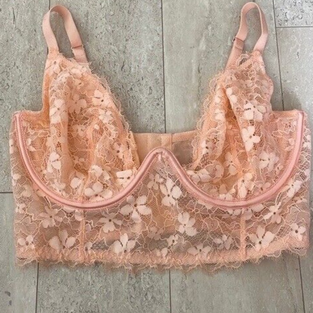 Light pink/orange/coral colored bralette. 
Brand: Victoria’s Secret 
Size: 34C